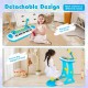 Kids piano keyboard toy in blue with microphone, placed on the floor for interactive music play and fun learning.