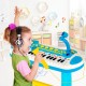 Kids piano keyboard toy in blue with microphone, featuring 31 keys, adjustable volume, and fun demo sounds for ages 3+.