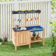 Wooden outdoor mud kitchen playset with stove, storage shelves, and kitchenware for imaginative play and skill.