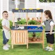 Wooden outdoor mud kitchen playset for kids with kitchenware, featuring shelves and hooks for imaginative play.