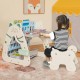 Child using the 3-in-1 double-sided magnetic dry-erase board with stool, featuring a book rack and art easel for.
