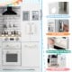 Wooden kid's corner kitchen playset with stove, realistic washing machine, and ample storage for imaginative play.