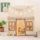 Large brown toddler playhouse with star string lights, mesh curtains, and spacious interior for kids' role-playing.