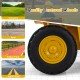 Quality textured wheel of the 12V Caterpillar kids ride-on dump truck, designed for various terrains like grassland and.