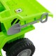 Green kids ride-on dump truck featuring a toy shovel attached to the side, designed for fun and safe outdoor play.