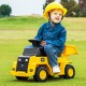 Child riding a yellow 6V electric Caterpillar construction vehicle with a detachable dump bed on grass.