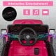Interactive dashboard of a pink 12V kids ride-on truck with Bluetooth, music controls, and power display for fun.
