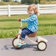 Toddler tricycle in beige with adjustable seat, ergonomic design, and rear basket for kids aged 3-5 years outdoors.