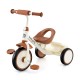 Toddler tricycle in beige with adjustable seat, all-terrain wheels, and rear storage basket for kids aged 3-5 years.