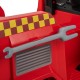 Red ride-on fire truck detail featuring a wrench and shovel for kids to learn basic skills while enjoying imaginative.