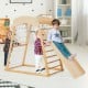 Kids playing on the 6-in-1 wooden jungle gym, showcasing the versatile design with a monkey bar and climbing net for.