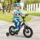 12-inch kids bike with adjustable seat and handlebars, featuring training wheels and a hand brake for safety.
