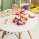 Colorful magnetic balls and rods set with various shapes for kids, promoting creativity and safe play in a playroom.