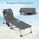 Tanning chair with adjustable backrest, face hole, and arm openings, folds flat for easy transport and storage.