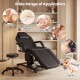 Tattoo chair in black with adjustable backrest and footrest, ideal for estheticians in spa and beauty settings.