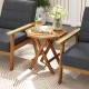 Teak wood octagon coffee table with slatted tabletop and X-shaped legs, perfect for outdoor gatherings and space-saving.