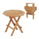Teak wood octagon coffee table with slatted top and X-shaped legs, perfect for camping and backyard use.