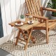 Teak wood square coffee table with slatted tabletop and X-shaped legs, perfect for outdoor use and easy storage.