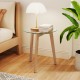 Round tempered glass end table with solid rubber wood legs, perfect as a bedside or coffee table for minimalist decor.