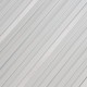 Close-up of the aluminum surface of a heavy-duty portable folding step ladder, designed for safety and stability.