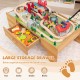 Wooden train set table with 100 pieces, featuring a large storage drawer for organizing toys and accessories.