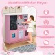 Toddler pretend play kitchen in pink with removable sink, stove, and accessories for imaginative play and skill.