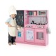 Toddler pretend play kitchen in pink with removable sink, stove, and accessories for imaginative cooking fun.