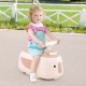 Toddler ride-on toy in beige with trailer, featuring 6 songs, stable design, and cute penguin appearance for indoor fun.