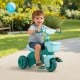 Toddler tricycle in green with front basket and bell, designed for kids aged 3-5, featuring anti-slip handlebars.
