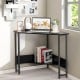 Triangle computer corner desk in black with a modern design, featuring a smooth tabletop and heavy-duty steel legs for.