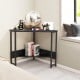 Triangle computer corner desk in black with charging station, ideal for small spaces and versatile use as a workstation.