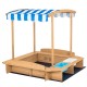 Kids wooden sandbox with striped canopy, solid cedar wood, includes plastic bins for sand and water play, perfect for.