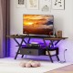 TV stand in rustic brown with adjustable LED lights, power outlets, and ample storage for 65-inch TVs.