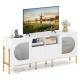 TV stand in white for 70-inch TV featuring drawers, open shelves, and built-in power outlets for convenient media.