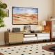 Mid-century modern TV stand with storage cabinet, designed for TVs up to 80 inches, featuring open compartments and.