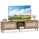 TV stand in oak finish with fluted doors, supporting TVs up to 70 inches, featuring open shelves and concealed storage.