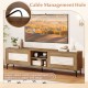 TV stand with cable management hole, oak finish, and waveform fluted doors for TVs up to 70 inches, ideal for organized.