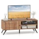Mid-century modern TV stand in oak for TVs up to 55 inches, featuring open shelves and a storage cabinet for.