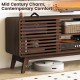Walnut TV stand for TVs up to 65", featuring sliding doors and adjustable shelves, perfect for living room storage.