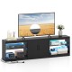 TV stand for TVs up to 85 inches with RGB LED lighting, storage cabinets, and built-in power outlets in black finish.