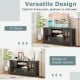 Black TV stand with glass doors and adjustable shelves, designed for versatile storage in living rooms or bedrooms.