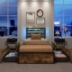 Twin bed frame with 4 large storage drawers and integrated RGB LED lighting, perfect for small rooms and organized.