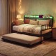 Close-up of the upholstered headboard on the Twin Size Daybed with Trundle, showcasing integrated charging station and.