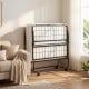 Twin size folding bed with metal frame and 5-inch gel memory foam mattress, compactly stored upright for easy access.