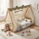 Twin size wooden bed with removable tent, antler theme, and protective side rails for a cozy children's sleep space.