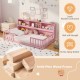 Montessori floor bed in pink with integrated bookshelf, sturdy pine wood frame, perfect for kids' play and sleep.