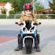 Child riding a blue BMW licensed electric motorcycle with three wheels, designed for safe indoor and outdoor fun.