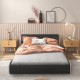 Full-size upholstered platform bed frame in faux leather with a curved headboard, styled for comfort and elegance.