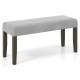 Gray padded end of bed bench with solid rubber wood legs, ideal for bedroom or entryway seating and storage.