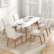 Beige upholstered dining chairs with rubber wood legs, featuring a cushioned seat and curved backrest for comfort.
